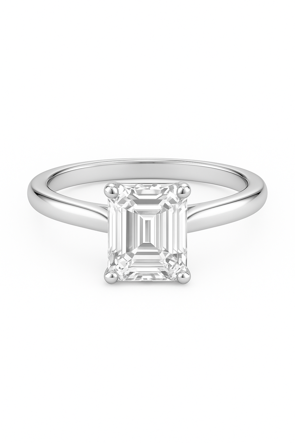 Emerald cut natural diamond ring in 18k white gold by Luxe Alchemy on white background