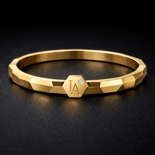 minimalist gold bracelet with geometric design and LA logo in 18k gold